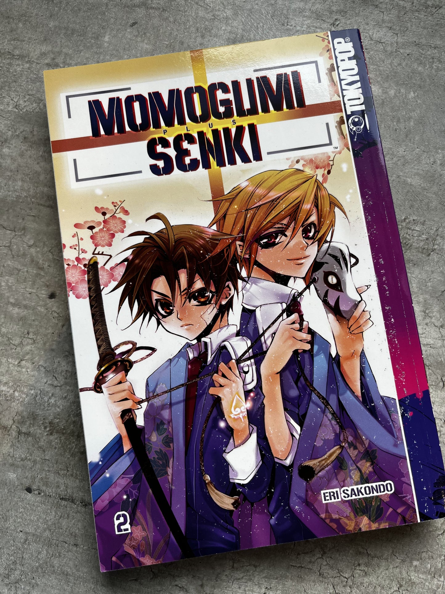 Momogumi Plus Senki Vol.2 - Eri Sakondo - (Inglés) Libro Manga